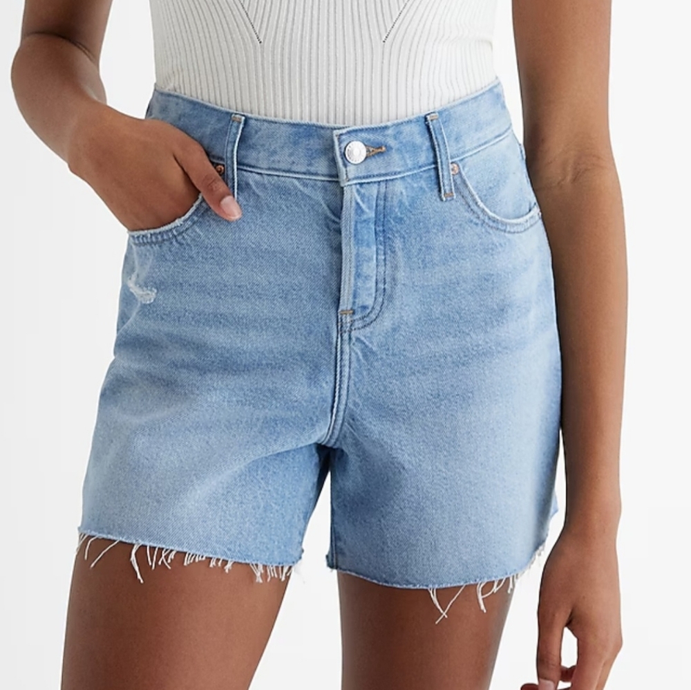 Express Mid Rise light wash raw hem jean shorts